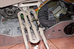 Как да премахнете нагревателен елемент от пералня